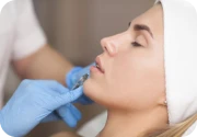 Woman receiving injection treatment