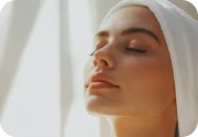 Contented woman with her eyes closed at a spa