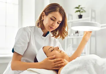 Woman receiving facial